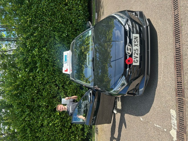 Celebrating a driving test pass at Crawley DVSA